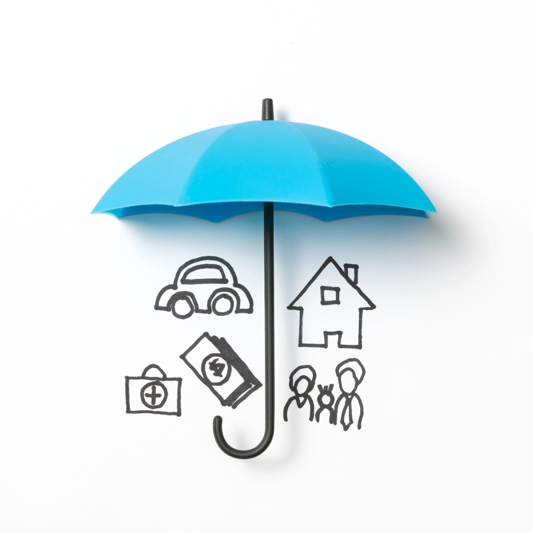 Umbrella with house and car and family under